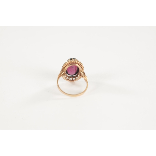 446 - A 14CT GOLD RING WITH LARGE CABOCHON AMETHYST, total weight app. 4.3g