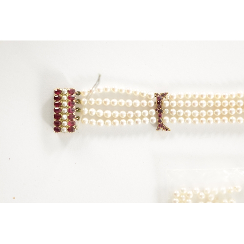 454 - A 19TH CENTURY GOLD, RUBY AND PEARL BRACELET total weight app. 23g (18cm long)