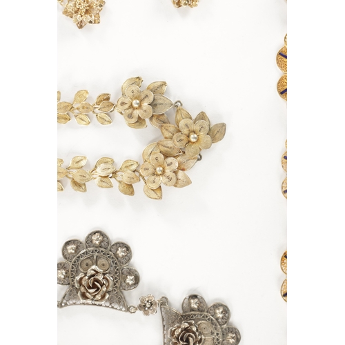 458 - A COLLECTION OF VINTAGE SILVER AND SILVER GILT JEWELLERY of filigree floral designs comprising two n... 