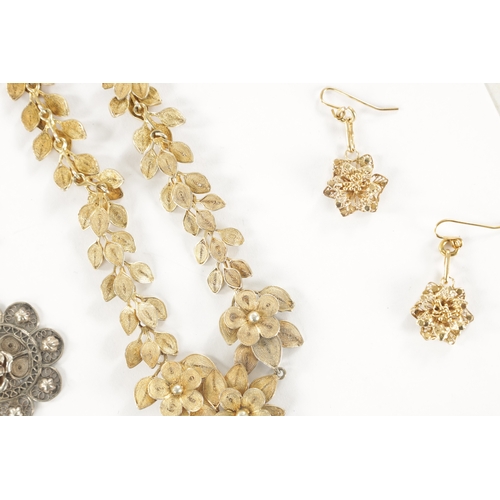 458 - A COLLECTION OF VINTAGE SILVER AND SILVER GILT JEWELLERY of filigree floral designs comprising two n... 