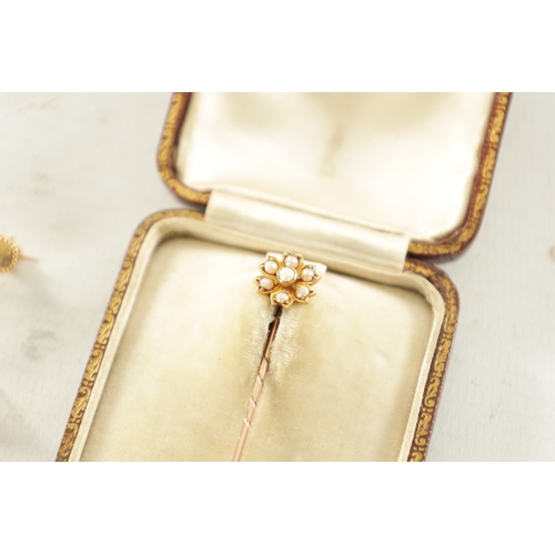 459 - TWO 9CT GOLD BROOCHES AND AN 18CT GOLD PIN BROOCH the pin brooch with pearl set flowerhead, another ... 