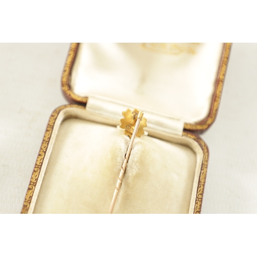 459 - TWO 9CT GOLD BROOCHES AND AN 18CT GOLD PIN BROOCH the pin brooch with pearl set flowerhead, another ... 