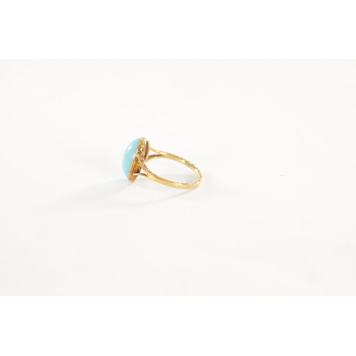 460 - A LADIES VINTAGE 18CT GOLD CABOCHON TURQUOISE RING with scrollwork engraved shank, total weight app.... 