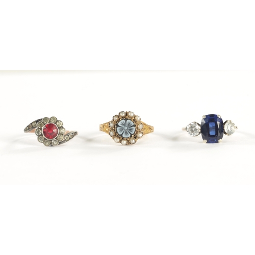 462 - A COLLECTION OF THREE GOLD RINGS comprising a 9ct gold ring with synthetic ruby, a 15ct gold sardony... 