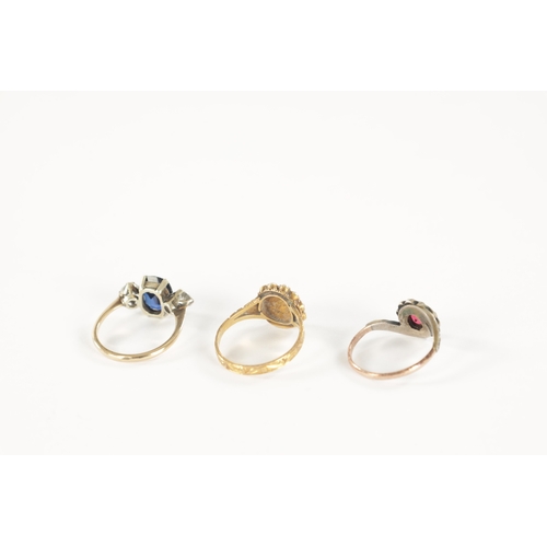 462 - A COLLECTION OF THREE GOLD RINGS comprising a 9ct gold ring with synthetic ruby, a 15ct gold sardony... 