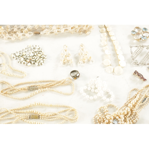 467 - A LARGE COLLECTION OF VINTAGE COSTUME JEWELLERY comprising brooches, necklaces, pendants, earrings a... 