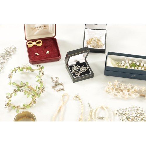 467 - A LARGE COLLECTION OF VINTAGE COSTUME JEWELLERY comprising brooches, necklaces, pendants, earrings a... 