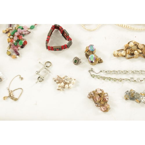 467 - A LARGE COLLECTION OF VINTAGE COSTUME JEWELLERY comprising brooches, necklaces, pendants, earrings a... 