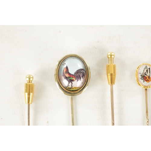 483 - A COLLECTION OF FOUR 9CT GOLD AND GILT METAL STICK PINS comprising an Essex crystal cockerel pin, a ... 