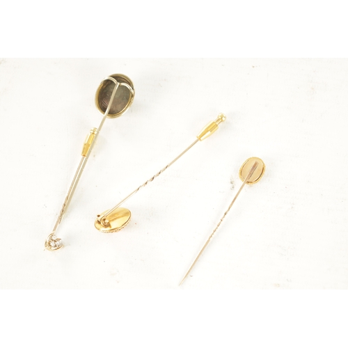 483 - A COLLECTION OF FOUR 9CT GOLD AND GILT METAL STICK PINS comprising an Essex crystal cockerel pin, a ... 