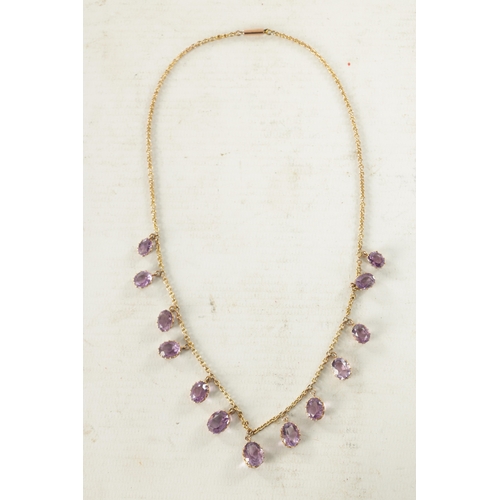 494 - A 9CT GOLD AND AMETHYST NECKLACE total weight app. 12.5g (44cm long)