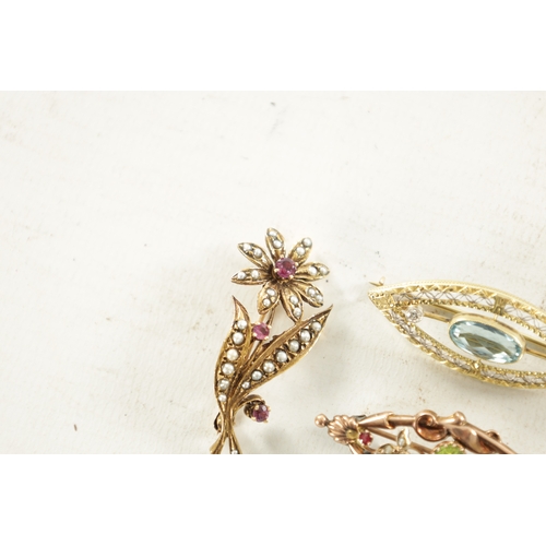 499 - THREE VINTAGE GOLD BROOCHES comprising of a 14ct yellow and white gold aquamarine and diamond brooch... 