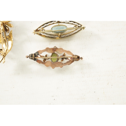 499 - THREE VINTAGE GOLD BROOCHES comprising of a 14ct yellow and white gold aquamarine and diamond brooch... 