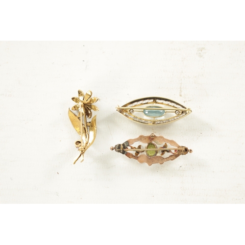 499 - THREE VINTAGE GOLD BROOCHES comprising of a 14ct yellow and white gold aquamarine and diamond brooch... 