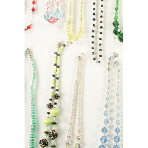 500 - A LARGE COLLECTION OF VINTAGE GLASS BEADED NECKLACES twenty-four in total.