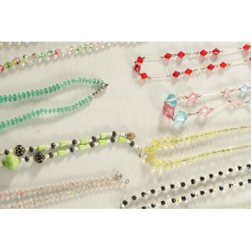 500 - A LARGE COLLECTION OF VINTAGE GLASS BEADED NECKLACES twenty-four in total.