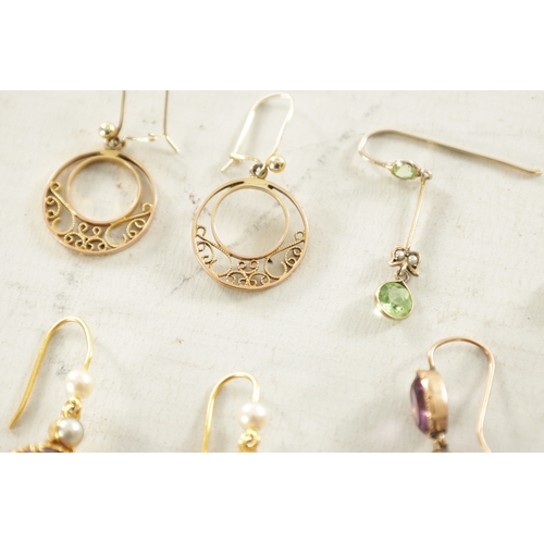 503 - A COLLECTION OF FOUR PAIRS OF 9CT GOLD EARRINGS a large pair of oval cut amethyst, a pair of pear cu... 