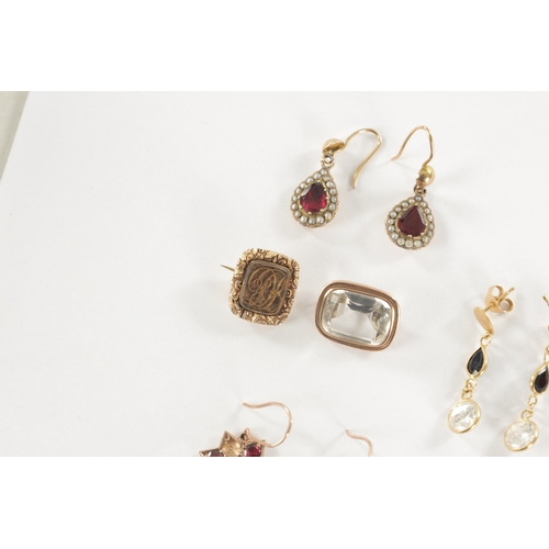 507 - A COLLECTION OF ANTIQUE 9CT GOLD JEWELLERY comprising of five pairs of earrings and two small brooch... 