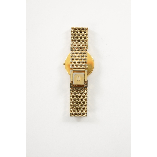 509 - A VINTAGE GOLD PLATED UNIVERSAL-GENEVE WRISTWATCH with original bracelet, the gold honeycomb dial wi... 