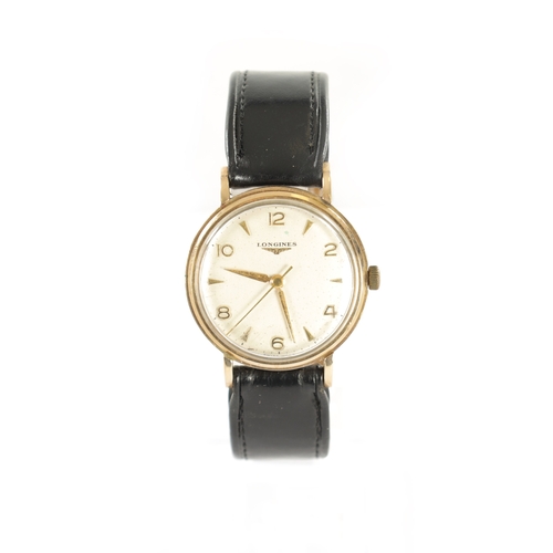 514 - A GENTLEMAN'S VINTAGE 9CT GOLD LONGINES WRISTWATCH on leather strap, the circular case enclosing a c... 