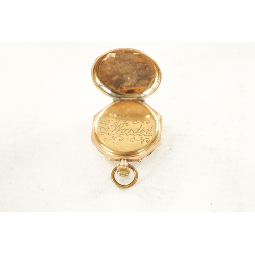 526 - A 9CT ROSE GOLD FOB WATCH with an engraved octagonal case enclosing an enamel dial with Roman numera... 