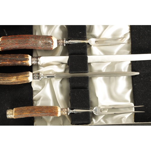 531 - TWO LATE 19TH CENTURY STAGHORN HANDLED CASED CARVING SETS (51cm and 42cm wide )