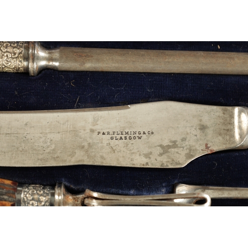 531 - TWO LATE 19TH CENTURY STAGHORN HANDLED CASED CARVING SETS (51cm and 42cm wide )