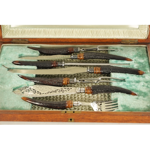 537 - A FINE CASED LATE VICTORIAN SILVER MOUNTED CARVING AND FISH SERVING SET with antler handles in fitte... 