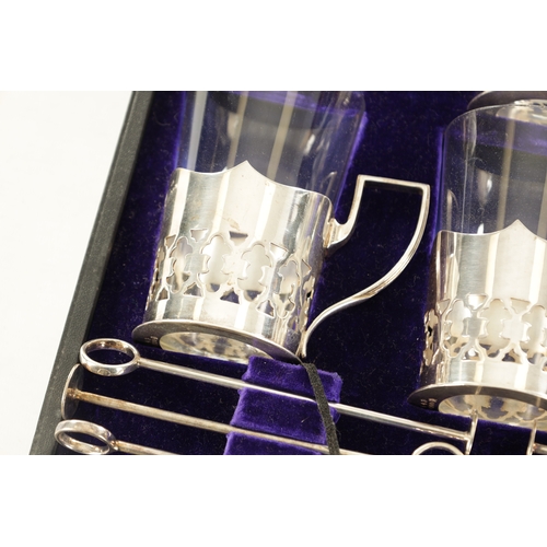 538 - A CASED SET OF EDWARDIAN LEMONADE GLASSES BY MARTIN HALL & CO. SHEFFIELD, with pierced silver plated... 