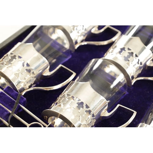 538 - A CASED SET OF EDWARDIAN LEMONADE GLASSES BY MARTIN HALL & CO. SHEFFIELD, with pierced silver plated... 