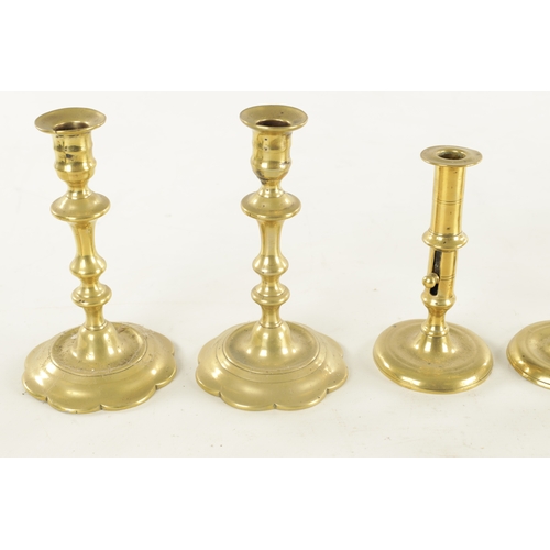 541 - THREE PAIRS OF 18TH CENTURY BRASS PETAL BASE AND EJECTOR STEM CANDLESTICKS and a later pair (petal b... 