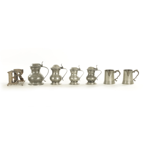 542 - A COLLECTION OF 18TH/19TH CENTURY PEWTER MUGS together with a silvered letter rack (19cm high )