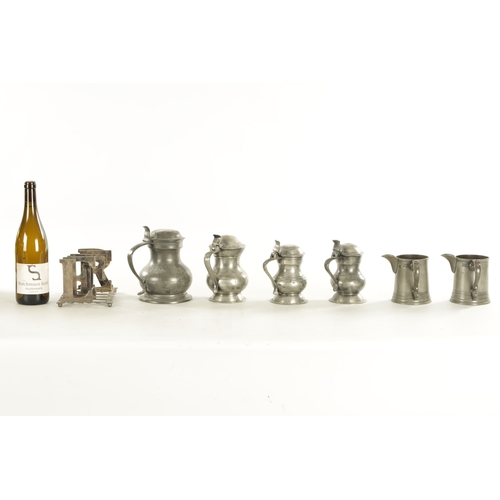 542 - A COLLECTION OF 18TH/19TH CENTURY PEWTER MUGS together with a silvered letter rack (19cm high )