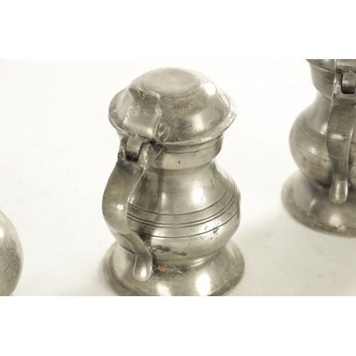 542 - A COLLECTION OF 18TH/19TH CENTURY PEWTER MUGS together with a silvered letter rack (19cm high )