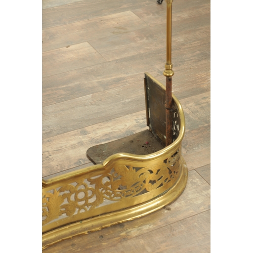 546 - A GOOD 18TH CENTURY COUNTRY HOUSE SERPENTINE ENGRAVED BRASS HEARTH FENDER with pierced and engraved ... 