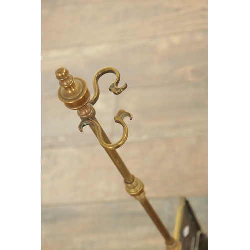 546 - A GOOD 18TH CENTURY COUNTRY HOUSE SERPENTINE ENGRAVED BRASS HEARTH FENDER with pierced and engraved ... 