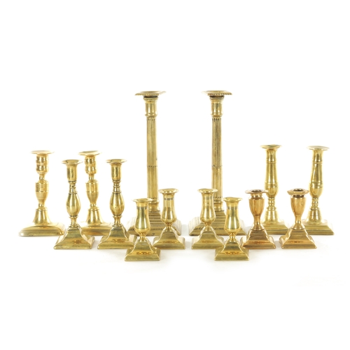 547 - A LARGE PAIR OF GEORGE III STEPPED SQUARE BASE BRASS CANDLESTICKS with stop fluted stems TOGETHER WI... 