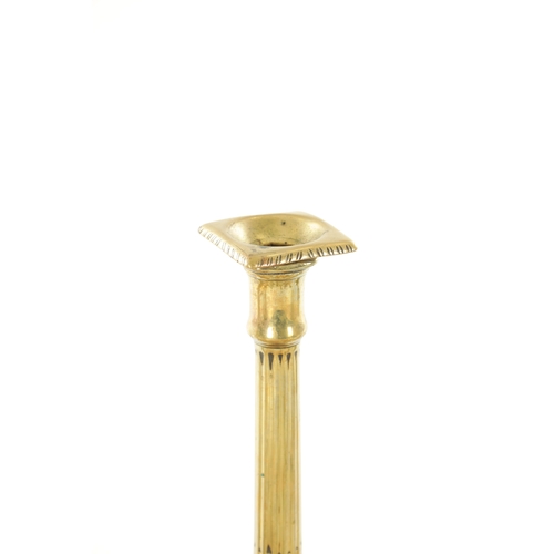 547 - A LARGE PAIR OF GEORGE III STEPPED SQUARE BASE BRASS CANDLESTICKS with stop fluted stems TOGETHER WI... 