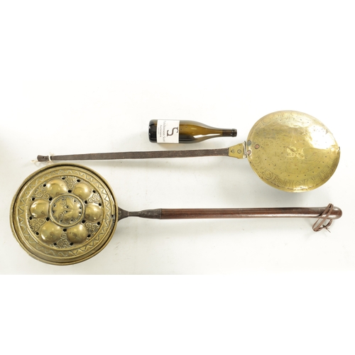 548 - TWO 17TH CENTURY DUTCH BRASS WARMING PANS with iron and turned wood handles (100cm overall and small... 