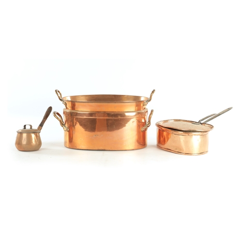 549 - A 19TH CENTURY SEAMED OVAL COPPER FISH KETTLE AND COVER another oval copper pan and a brandy saucepa... 