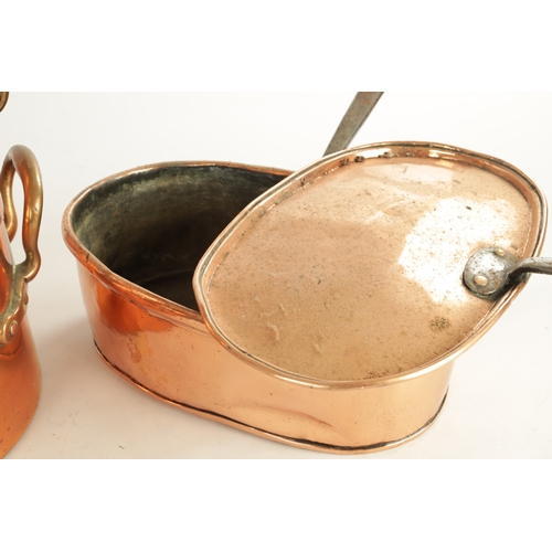 549 - A 19TH CENTURY SEAMED OVAL COPPER FISH KETTLE AND COVER another oval copper pan and a brandy saucepa... 