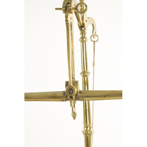 556 - A SET OF 19TH CENTURY BRASS BEAM SCALES plus weights (58cm high )