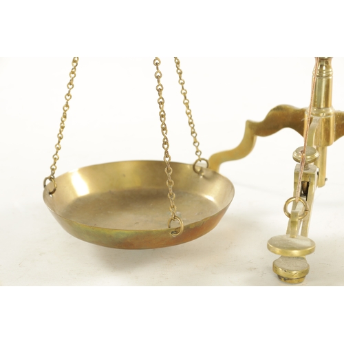 556 - A SET OF 19TH CENTURY BRASS BEAM SCALES plus weights (58cm high )