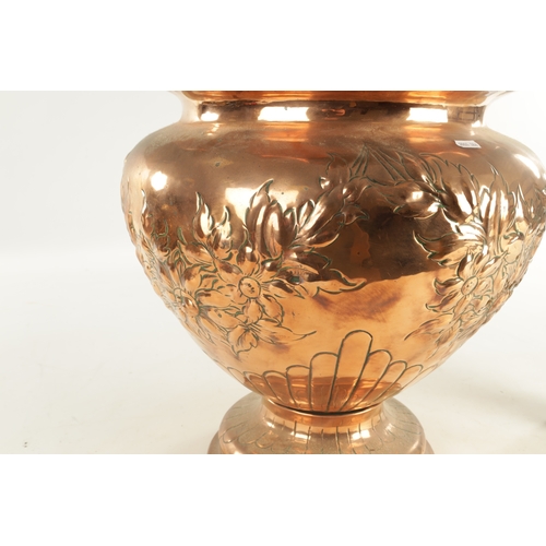 557 - AN OVERSIZED ART NOUVEAU PEDESTAL JARDINIERE with floral embossed decoration (46cm diameter 47cm hig... 