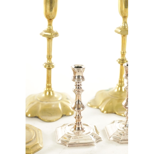 561 - A COLLECTION OF FOUR PAIRS OF 18TH CENTURY STYLE CAST BRASS CANDLESTICKS of various shapes and desig... 