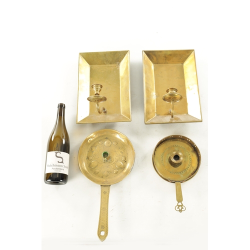 562 - A PAIR OF 19TH CENTURY HANGING BRASS CANDLELIGHTS TOGETHER WITH TWO PRESSED BRASS CHAMBER STICKS cha... 