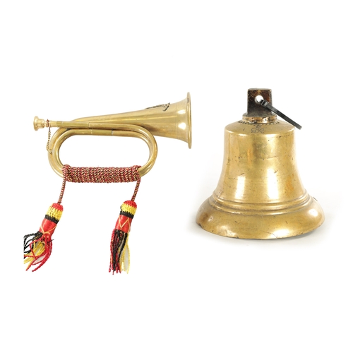 564 - A LARGE BRASS SHIPS BELL monogrammed G R together with a brass military bugle (bell 27cm high bugle ... 