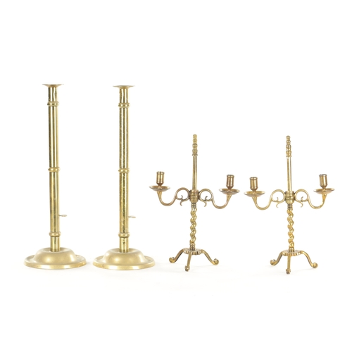 566 - A PAIR OF 18TH CENTURY CAST BRASS ADJUSTABLE CANDLELIGHTS TOGETHER WITH A LARGE PAIR OF 19TH CENTURY... 