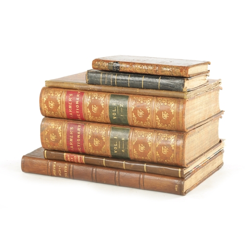 575 - A COLLECTION OF SEVEN AGRICULTURAL LEATHER BOUND BOOKS comprising two volumes of 'Farmers Dictionary... 