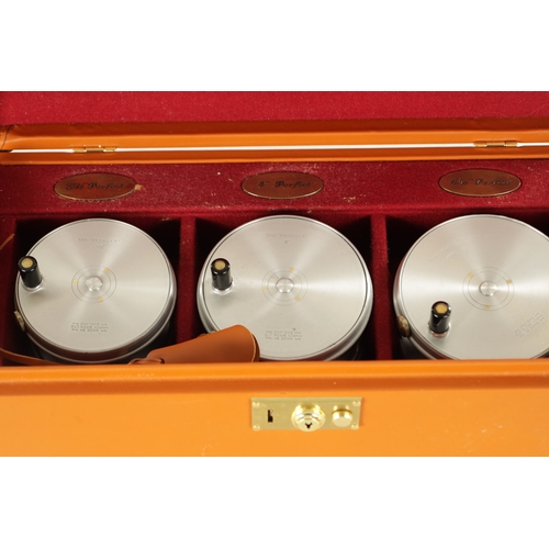 585 - A SET OF THREE HOUSE OF HARDY LEATHER CASED LIMITED EDITION PERFECT FLY FISHING REELS sizes 3 3/4